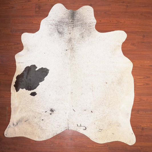 The Nguni Guy Nguni cowhide African decor Authentic cowhide Home decor Interior design Unique pattern Hand-selected Premium quality Natural beauty Exotic rug Genuine hide Statement piece Contemporary style Ethically sourced Sustainable decor Versatile accent Luxury rug Designer piece Modern aesthetic High-end craftsmanship Timeless elegance Designer home accents
