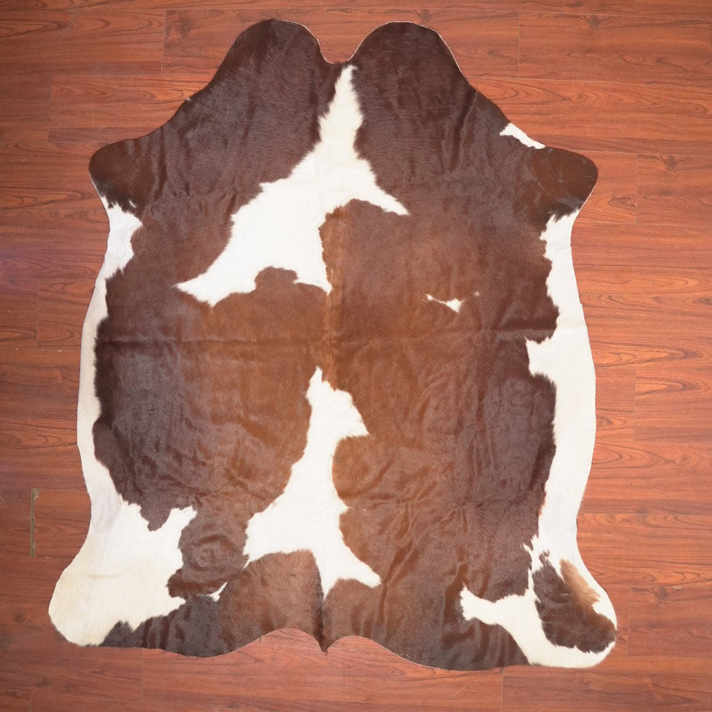 The Nguni Guy Nguni cowhide African decor Authentic cowhide Home decor Interior design Unique pattern Hand-selected Premium quality Natural beauty Exotic rug Genuine hide Statement piece Contemporary style Ethically sourced Sustainable decor Versatile accent Luxury rug Designer piece Modern aesthetic High-end craftsmanship Timeless elegance Designer home accents
