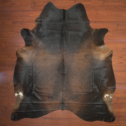 The Nguni Guy Nguni cowhide African decor Authentic cowhide Home decor Interior design Unique pattern Hand-selected Premium quality Natural beauty Exotic rug Genuine hide Statement piece Contemporary style Ethically sourced Sustainable decor Versatile accent Luxury rug Designer piece Modern aesthetic High-end craftsmanship Timeless elegance Designer home accents
