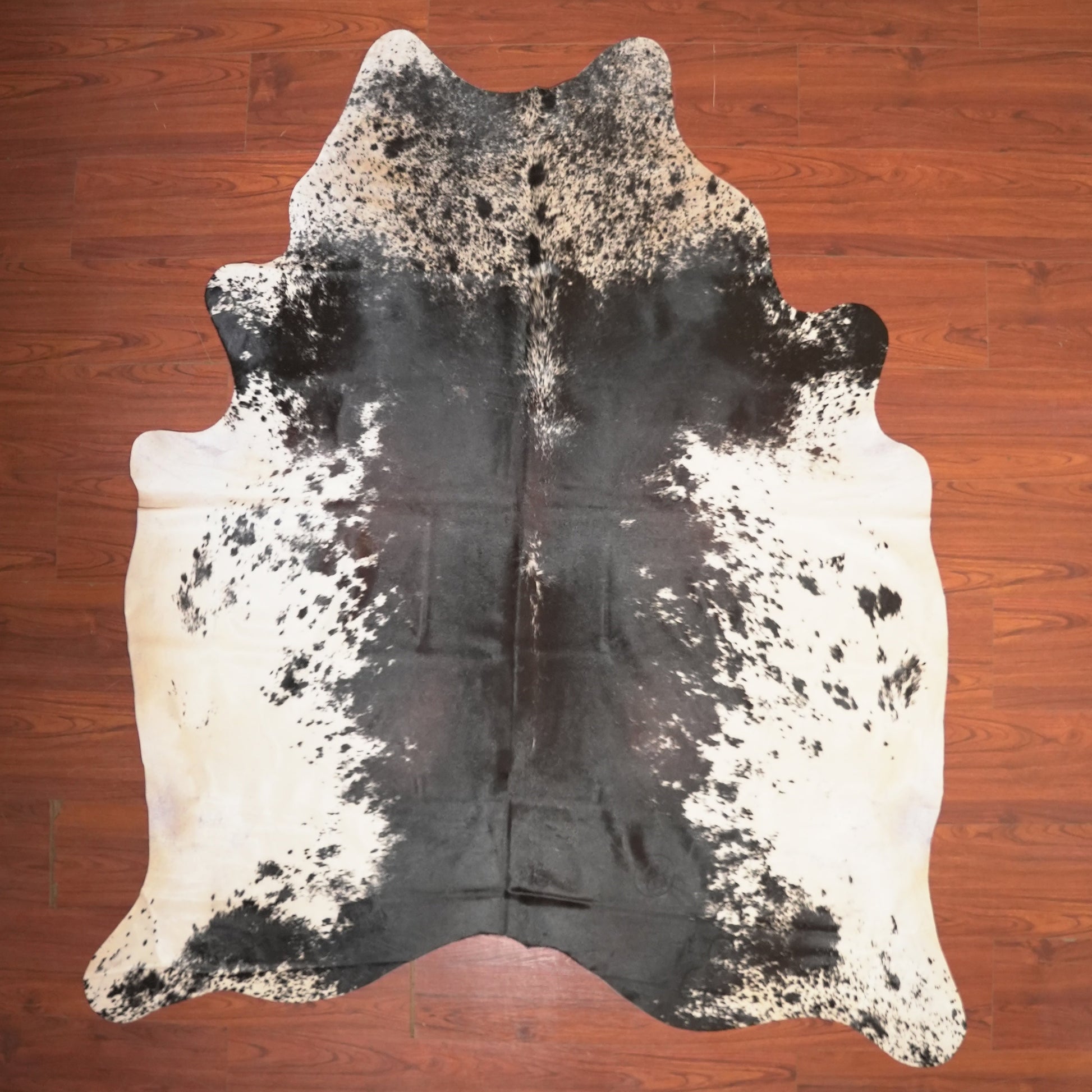 The Nguni Guy Nguni cowhide African decor Authentic cowhide Home decor Interior design Unique pattern Hand-selected Premium quality Natural beauty Exotic rug Genuine hide Statement piece Contemporary style Ethically sourced Sustainable decor Versatile accent Luxury rug Designer piece Modern aesthetic High-end craftsmanship Timeless elegance Designer home accents
