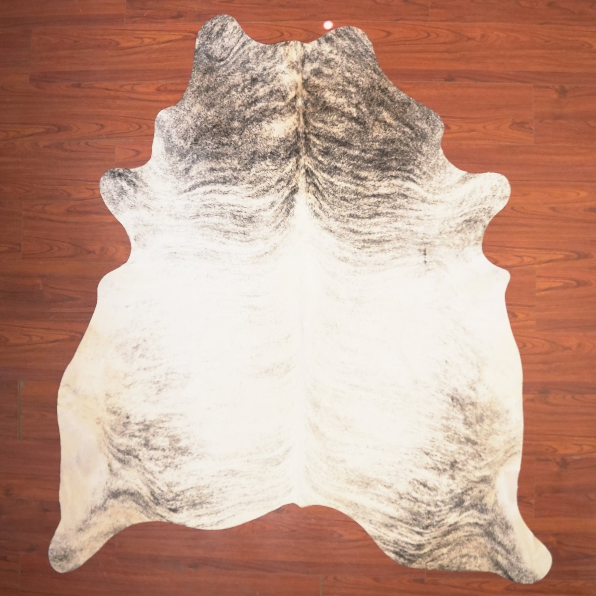The Nguni Guy Nguni cowhide African decor Authentic cowhide Home decor Interior design Unique pattern Hand-selected Premium quality Natural beauty Exotic rug Genuine hide Statement piece Contemporary style Ethically sourced Sustainable decor Versatile accent Luxury rug Designer piece Modern aesthetic High-end craftsmanship Timeless elegance Designer home accents
