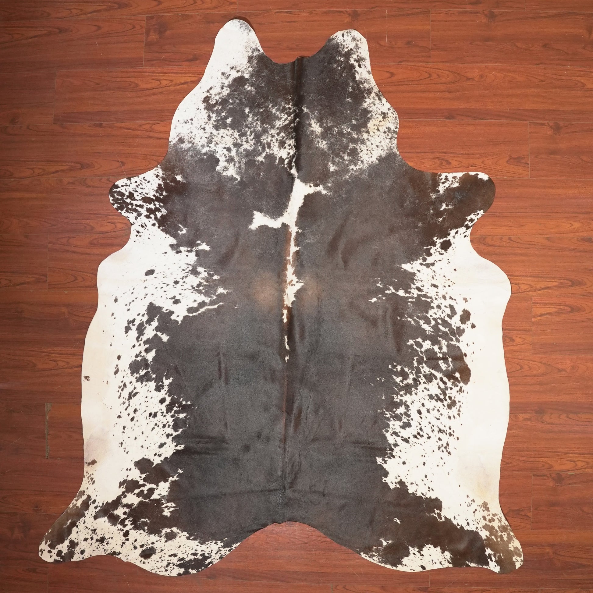 The Nguni Guy Nguni cowhide African decor Authentic cowhide Home decor Interior design Unique pattern Hand-selected Premium quality Natural beauty Exotic rug Genuine hide Statement piece Contemporary style Ethically sourced Sustainable decor Versatile accent Luxury rug Designer piece Modern aesthetic High-end craftsmanship Timeless elegance Designer home accents
