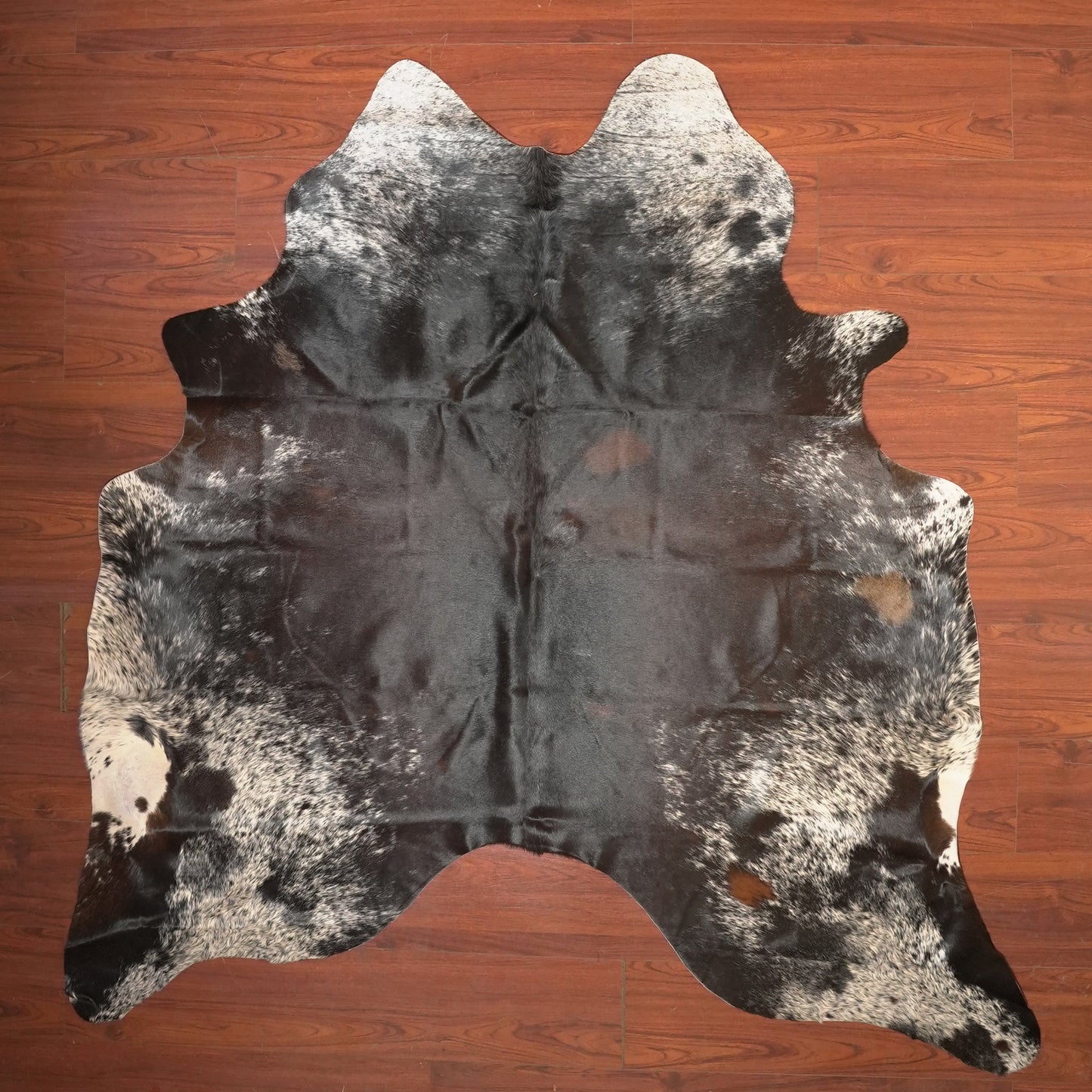 The Nguni Guy Nguni cowhide African decor Authentic cowhide Home decor Interior design Unique pattern Hand-selected Premium quality Natural beauty Exotic rug Genuine hide Statement piece Contemporary style Ethically sourced Sustainable decor Versatile accent Luxury rug Designer piece Modern aesthetic High-end craftsmanship Timeless elegance Designer home accents

