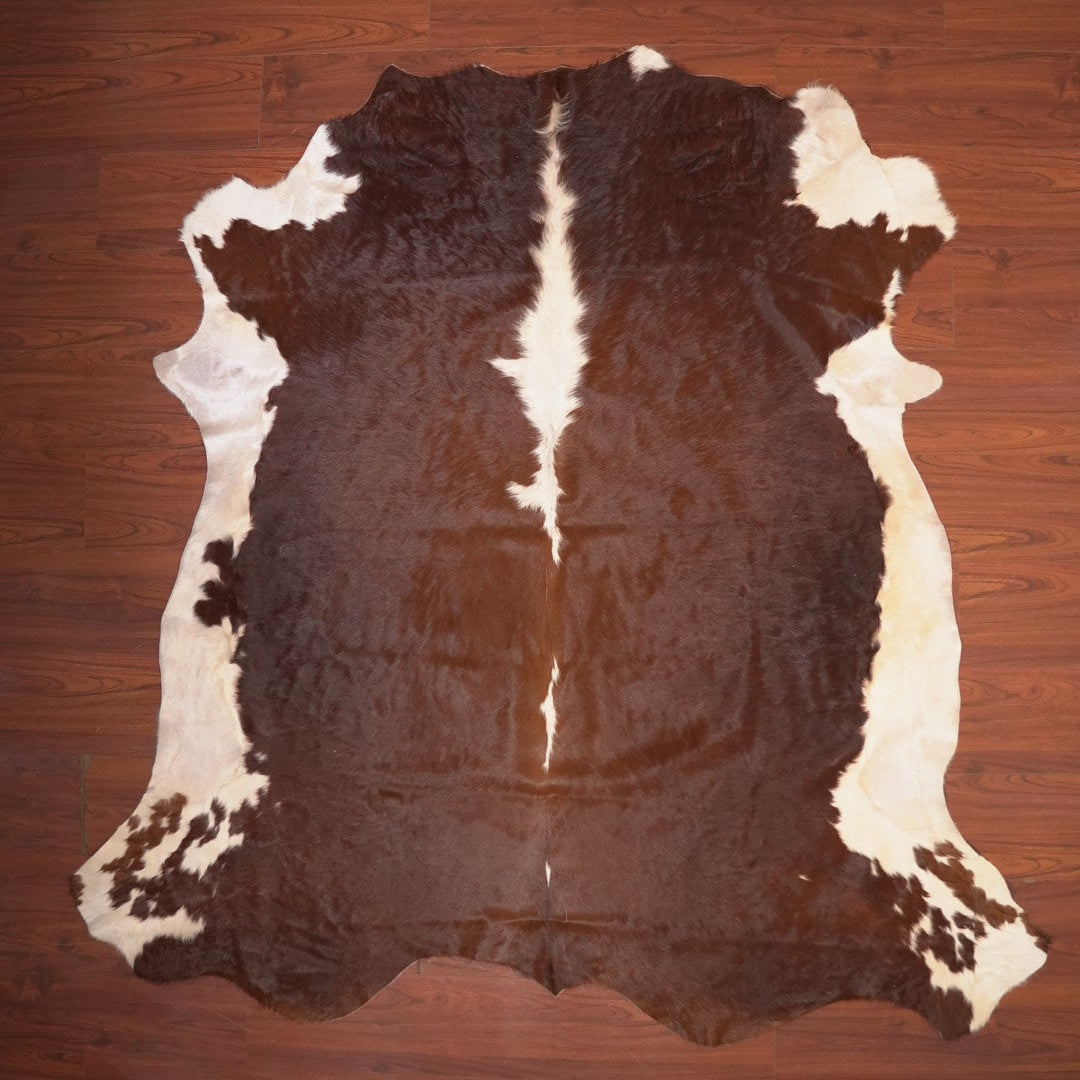The Nguni Guy Nguni cowhide African decor Authentic cowhide Home decor Interior design Unique pattern Hand-selected Premium quality Natural beauty Exotic rug Genuine hide Statement piece Contemporary style Ethically sourced Sustainable decor Versatile accent Luxury rug Designer piece Modern aesthetic High-end craftsmanship Timeless elegance Designer home accents
