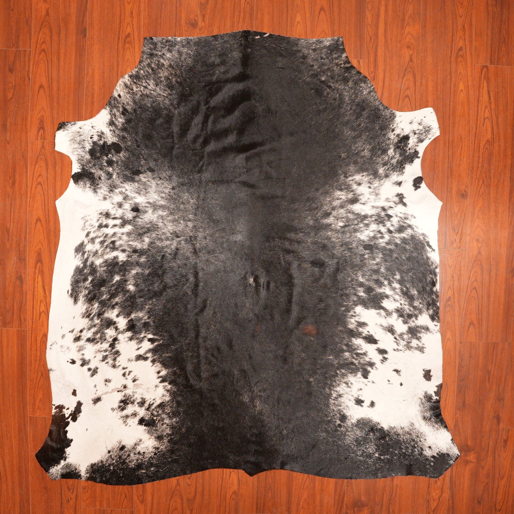 The Nguni Guy Nguni cowhide African decor Authentic cowhide Home decor Interior design Unique pattern Hand-selected Premium quality Natural beauty Exotic rug Genuine hide Statement piece Contemporary style Ethically sourced Sustainable decor Versatile accent Luxury rug Designer piece Modern aesthetic High-end craftsmanship Timeless elegance Designer home accents