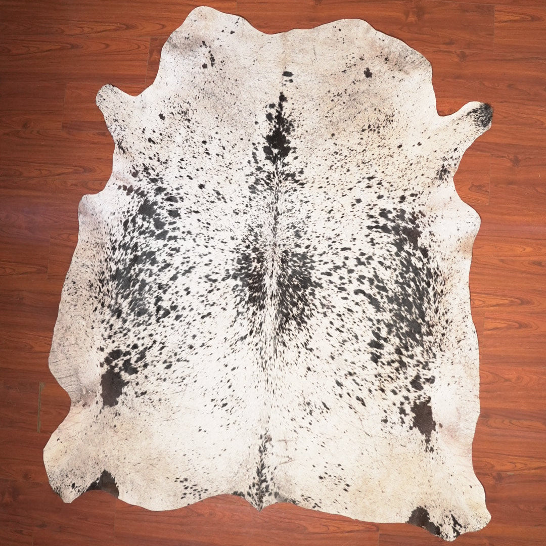 The Nguni Guy Nguni cowhide African decor Authentic cowhide Home decor Interior design Unique pattern Hand-selected Premium quality Natural beauty Exotic rug Genuine hide Statement piece Contemporary style Ethically sourced Sustainable decor Versatile accent Luxury rug Designer piece Modern aesthetic High-end craftsmanship Timeless elegance Designer home accents
