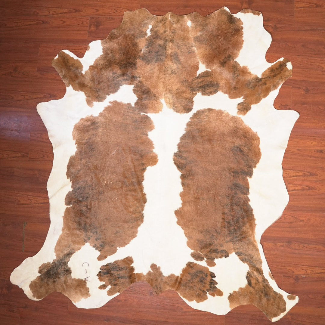 The Nguni Guy Nguni cowhide African decor Authentic cowhide Home decor Interior design Unique pattern Hand-selected Premium quality Natural beauty Exotic rug Genuine hide Statement piece Contemporary style Ethically sourced Sustainable decor Versatile accent Luxury rug Designer piece Modern aesthetic High-end craftsmanship Timeless elegance Designer home accents
