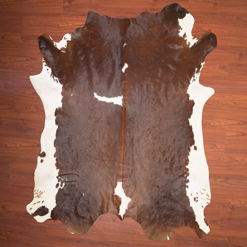 The Nguni Guy Nguni cowhide African decor Authentic cowhide Home decor Interior design Unique pattern Hand-selected Premium quality Natural beauty Exotic rug Genuine hide Statement piece Contemporary style Ethically sourced Sustainable decor Versatile accent Luxury rug Designer piece Modern aesthetic High-end craftsmanship Timeless elegance Designer home accents
