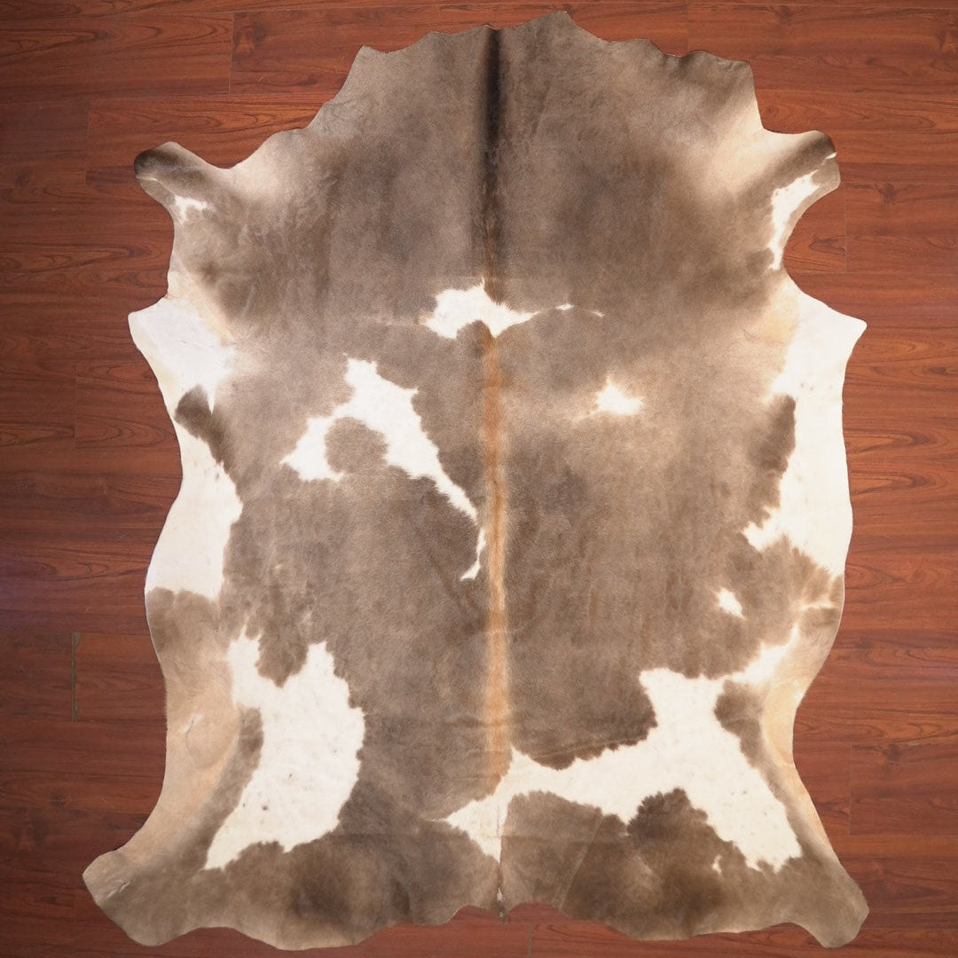 The Nguni Guy Nguni cowhide African decor Authentic cowhide Home decor Interior design Unique pattern Hand-selected Premium quality Natural beauty Exotic rug Genuine hide Statement piece Contemporary style Ethically sourced Sustainable decor Versatile accent Luxury rug Designer piece Modern aesthetic High-end craftsmanship Timeless elegance Designer home accents

