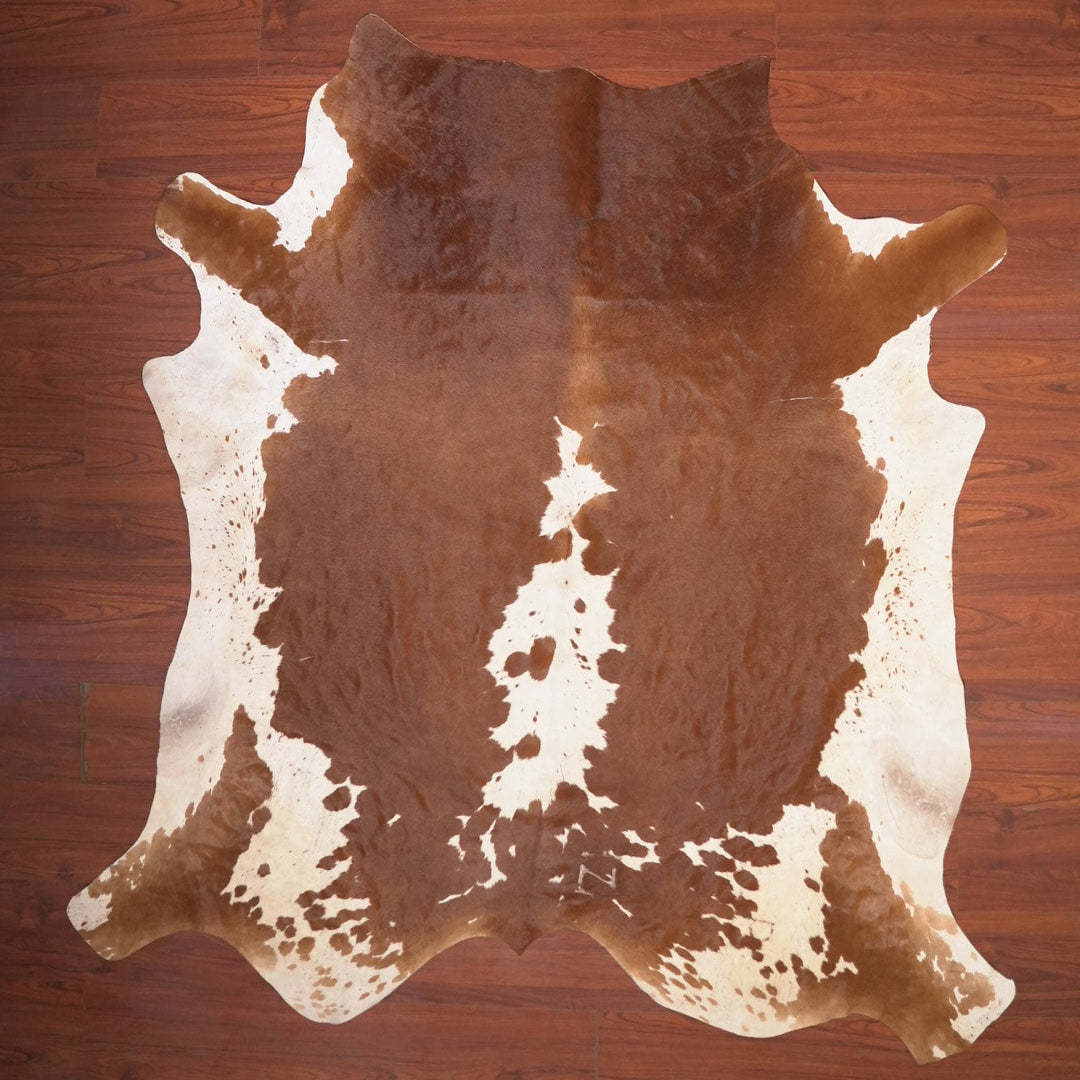 The Nguni Guy Nguni cowhide African decor Authentic cowhide Home decor Interior design Unique pattern Hand-selected Premium quality Natural beauty Exotic rug Genuine hide Statement piece Contemporary style Ethically sourced Sustainable decor Versatile accent Luxury rug Designer piece Modern aesthetic High-end craftsmanship Timeless elegance Designer home accents
