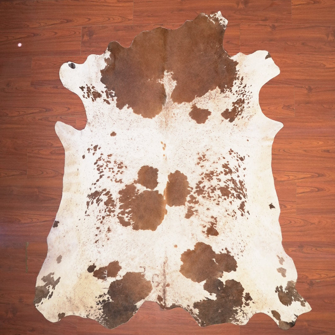 The Nguni Guy Nguni cowhide African decor Authentic cowhide Home decor Interior design Unique pattern Hand-selected Premium quality Natural beauty Exotic rug Genuine hide Statement piece Contemporary style Ethically sourced Sustainable decor Versatile accent Luxury rug Designer piece Modern aesthetic High-end craftsmanship Timeless elegance Designer home accents
