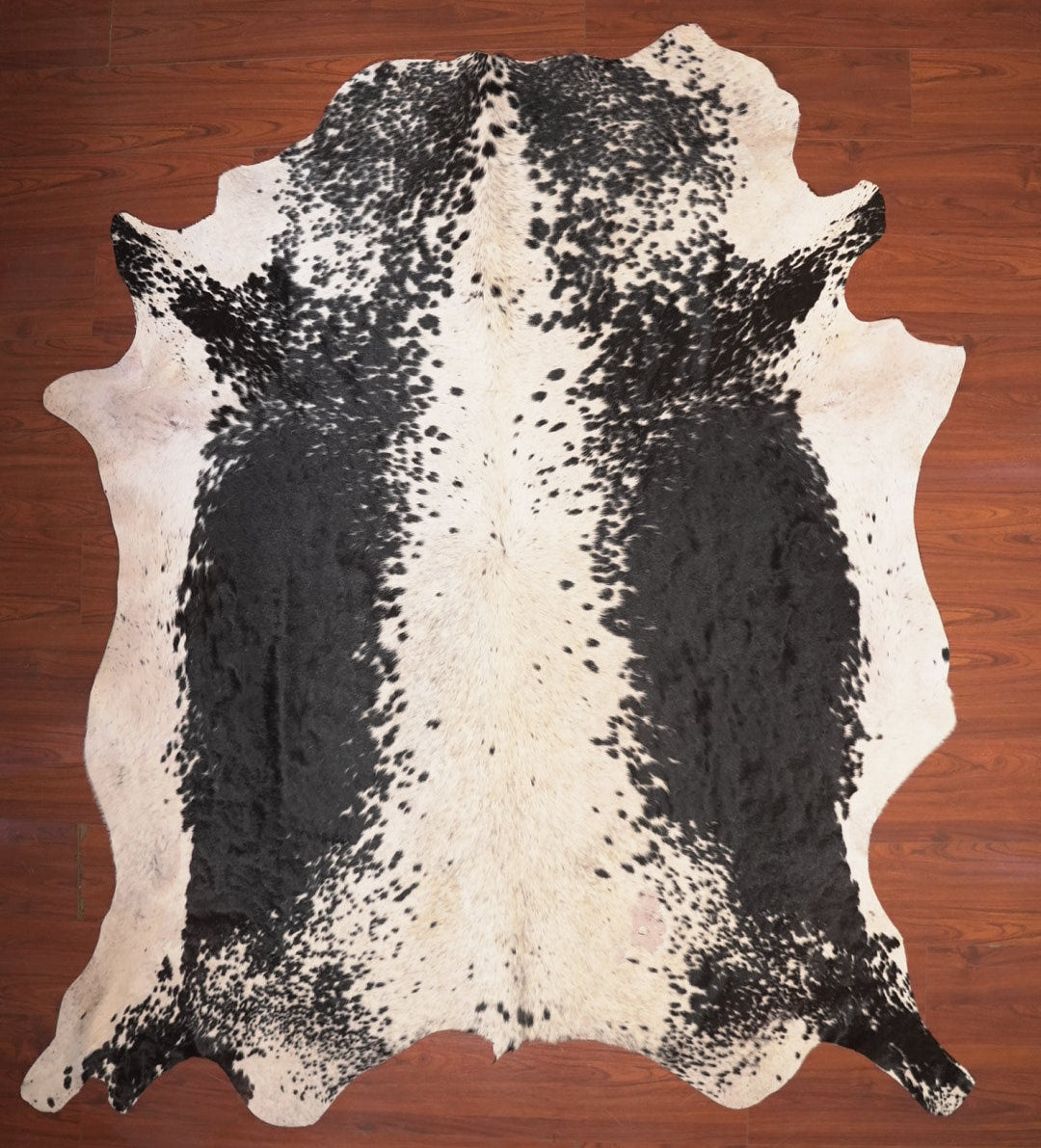 The Nguni Guy Nguni cowhide African decor Authentic cowhide Home decor Interior design Unique pattern Hand-selected Premium quality Natural beauty Exotic rug Genuine hide Statement piece Contemporary style Ethically sourced Sustainable decor Versatile accent Luxury rug Designer piece Modern aesthetic High-end craftsmanship Timeless elegance Designer home accents
