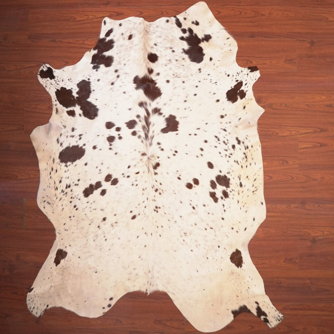 The Nguni Guy Nguni cowhide African decor Authentic cowhide Home decor Interior design Unique pattern Hand-selected Premium quality Natural beauty Exotic rug Genuine hide Statement piece Contemporary style Ethically sourced Sustainable decor Versatile accent Luxury rug Designer piece Modern aesthetic High-end craftsmanship Timeless elegance Designer home accents

