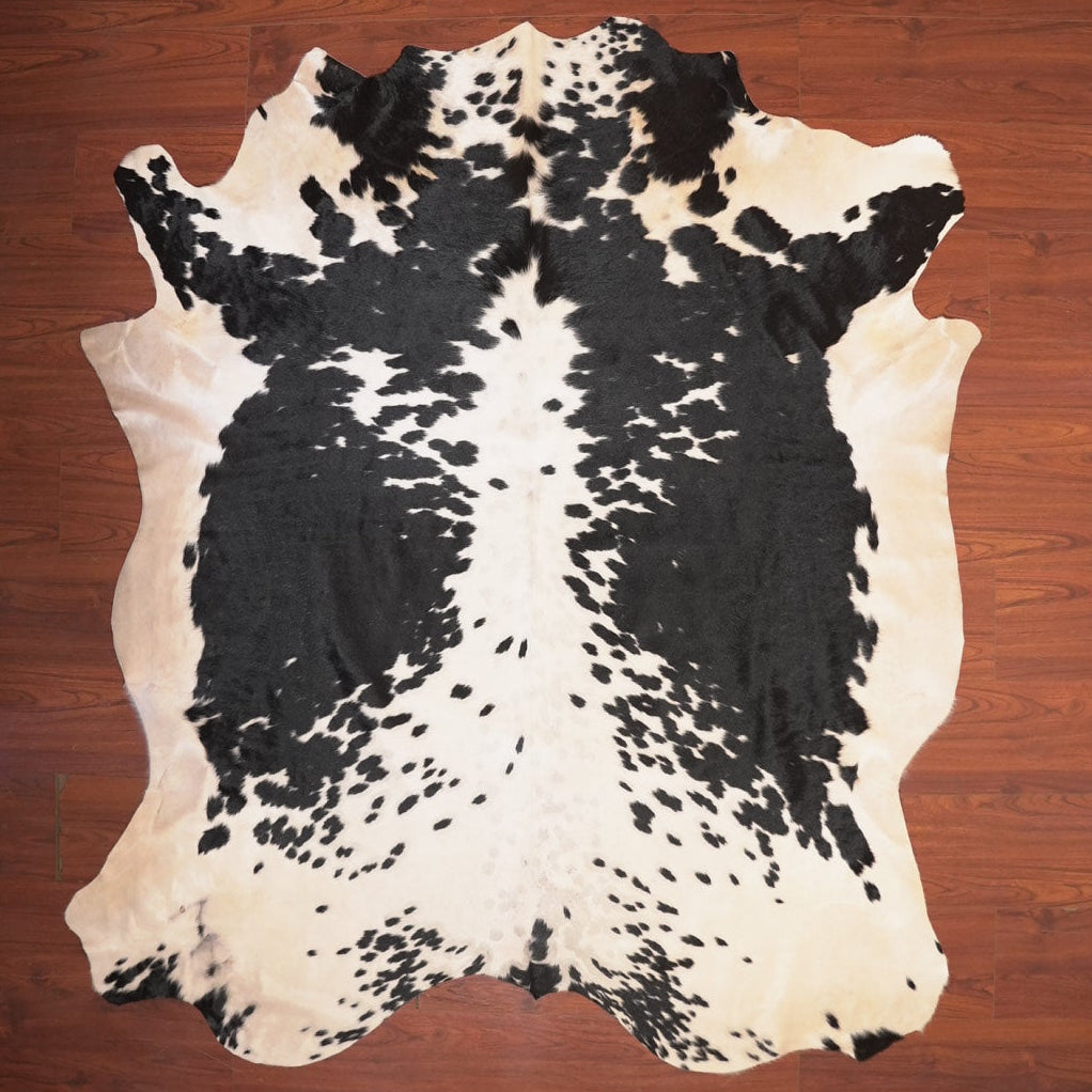 The Nguni Guy Nguni cowhide African decor Authentic cowhide Home decor Interior design Unique pattern Hand-selected Premium quality Natural beauty Exotic rug Genuine hide Statement piece Contemporary style Ethically sourced Sustainable decor Versatile accent Luxury rug Designer piece Modern aesthetic High-end craftsmanship Timeless elegance Designer home accents
