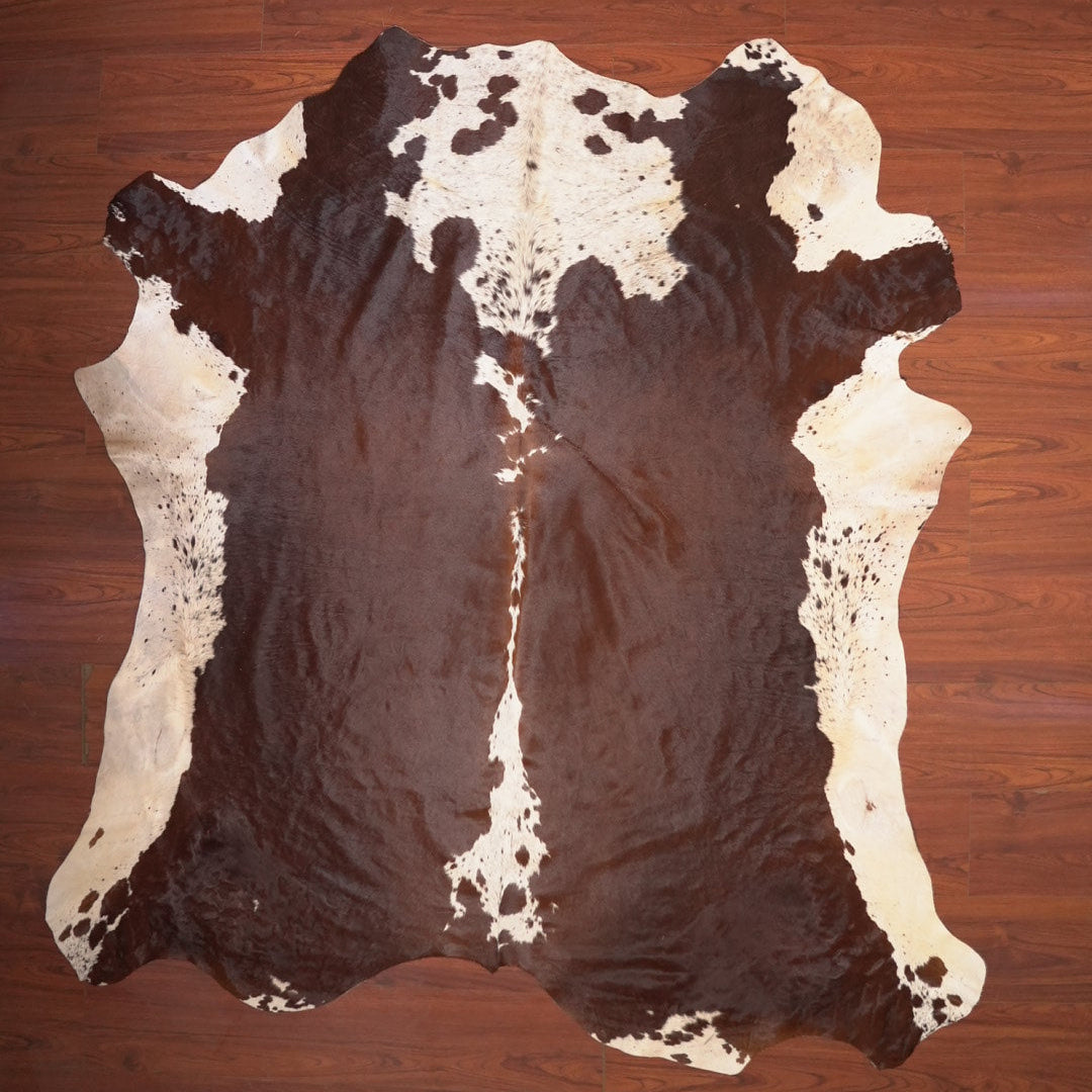 The Nguni Guy Nguni cowhide African decor Authentic cowhide Home decor Interior design Unique pattern Hand-selected Premium quality Natural beauty Exotic rug Genuine hide Statement piece Contemporary style Ethically sourced Sustainable decor Versatile accent Luxury rug Designer piece Modern aesthetic High-end craftsmanship Timeless elegance Designer home accents
