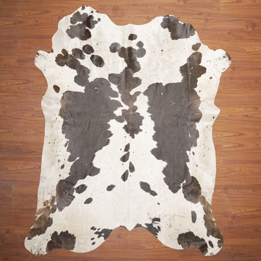 The Nguni Guy Nguni cowhide African decor Authentic cowhide Home decor Interior design Unique pattern Hand-selected Premium quality Natural beauty Exotic rug Genuine hide Statement piece Contemporary style Ethically sourced Sustainable decor Versatile accent Luxury rug Designer piece Modern aesthetic High-end craftsmanship Timeless elegance Designer home accents
