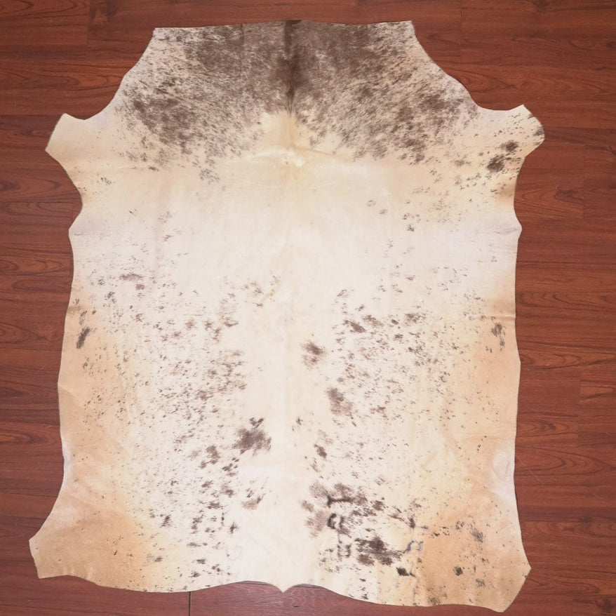 Rawhide with natural patterns on a wooden surface