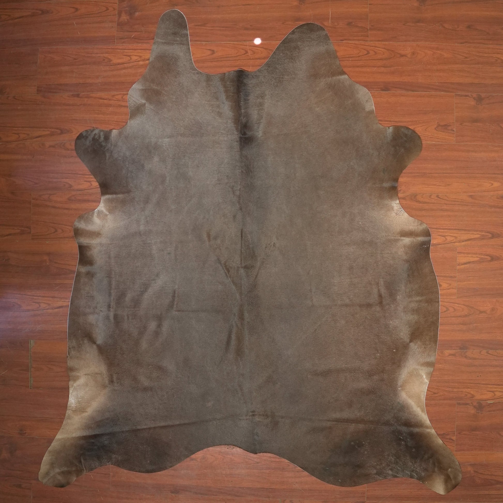 The Nguni Guy Nguni cowhide African decor Authentic cowhide Home decor Interior design Unique pattern Hand-selected Premium quality Natural beauty Exotic rug Genuine hide Statement piece Contemporary style Ethically sourced Sustainable decor Versatile accent Luxury rug Designer piece Modern aesthetic High-end craftsmanship Timeless elegance Designer home accents

