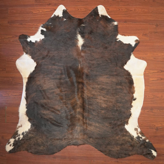 The Nguni Guy Nguni cowhide African decor Authentic cowhide Home decor Interior design Unique pattern Hand-selected Premium quality Natural beauty Exotic rug Genuine hide Statement piece Contemporary style Ethically sourced Sustainable decor Versatile accent Luxury rug Designer piece Modern aesthetic High-end craftsmanship Timeless elegance Designer home accents