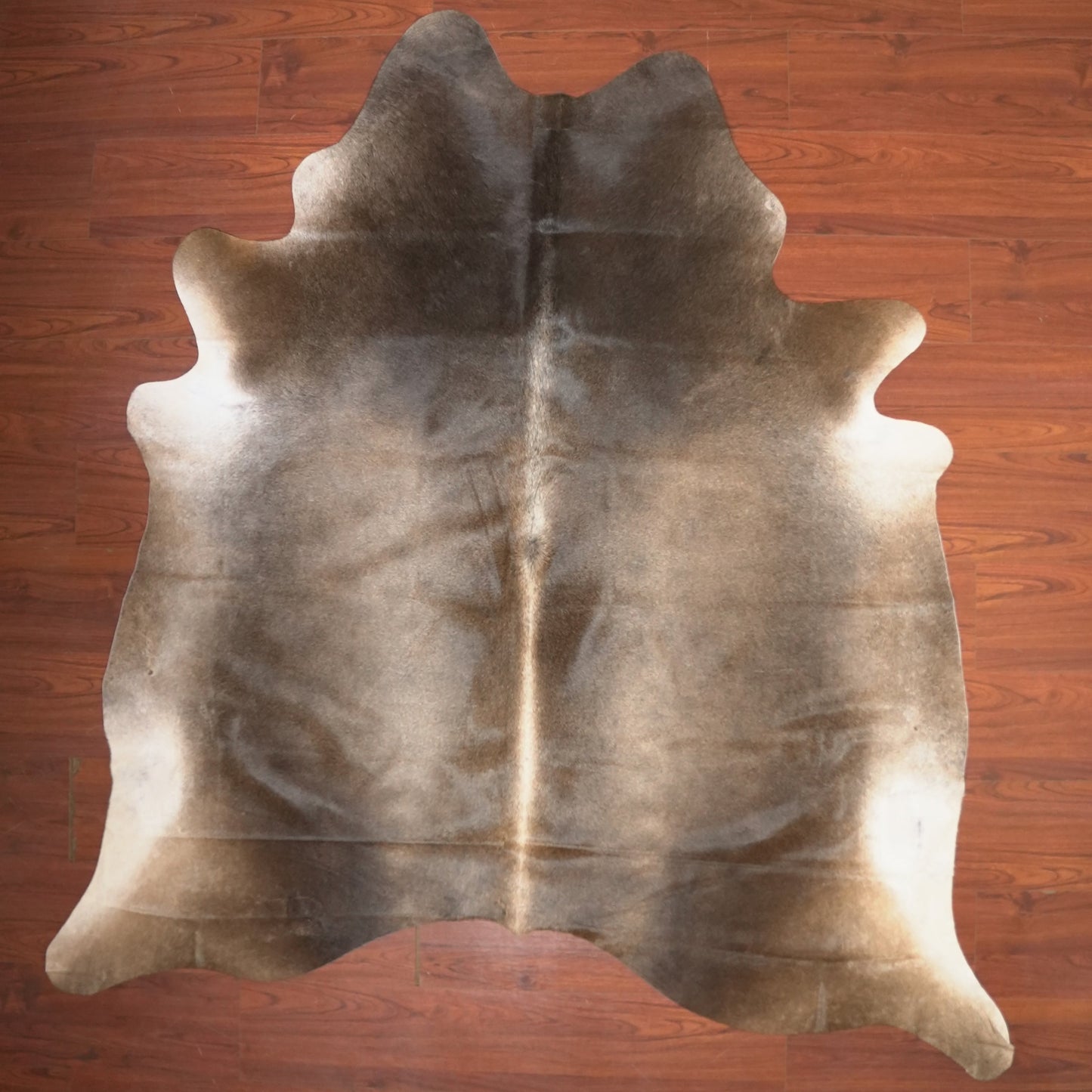 The Nguni Guy Nguni cowhide African decor Authentic cowhide Home decor Interior design Unique pattern Hand-selected Premium quality Natural beauty Exotic rug Genuine hide Statement piece Contemporary style Ethically sourced Sustainable decor Versatile accent Luxury rug Designer piece Modern aesthetic High-end craftsmanship Timeless elegance Designer home accents
