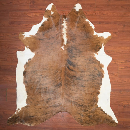 The Nguni Guy Nguni cowhide African decor Authentic cowhide Home decor Interior design Unique pattern Hand-selected Premium quality Natural beauty Exotic rug Genuine hide Statement piece Contemporary style Ethically sourced Sustainable decor Versatile accent Luxury rug Designer piece Modern aesthetic High-end craftsmanship Timeless elegance Designer home accents
