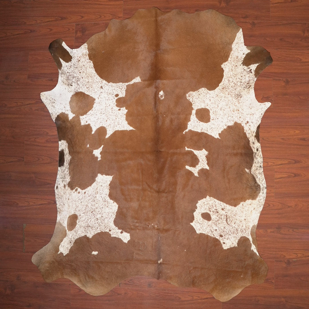 The Nguni Guy Nguni cowhide African decor Authentic cowhide Home decor Interior design Unique pattern Hand-selected Premium quality Natural beauty Exotic rug Genuine hide Statement piece Contemporary style Ethically sourced Sustainable decor Versatile accent Luxury rug Designer piece Modern aesthetic High-end craftsmanship Timeless elegance Designer home accents
