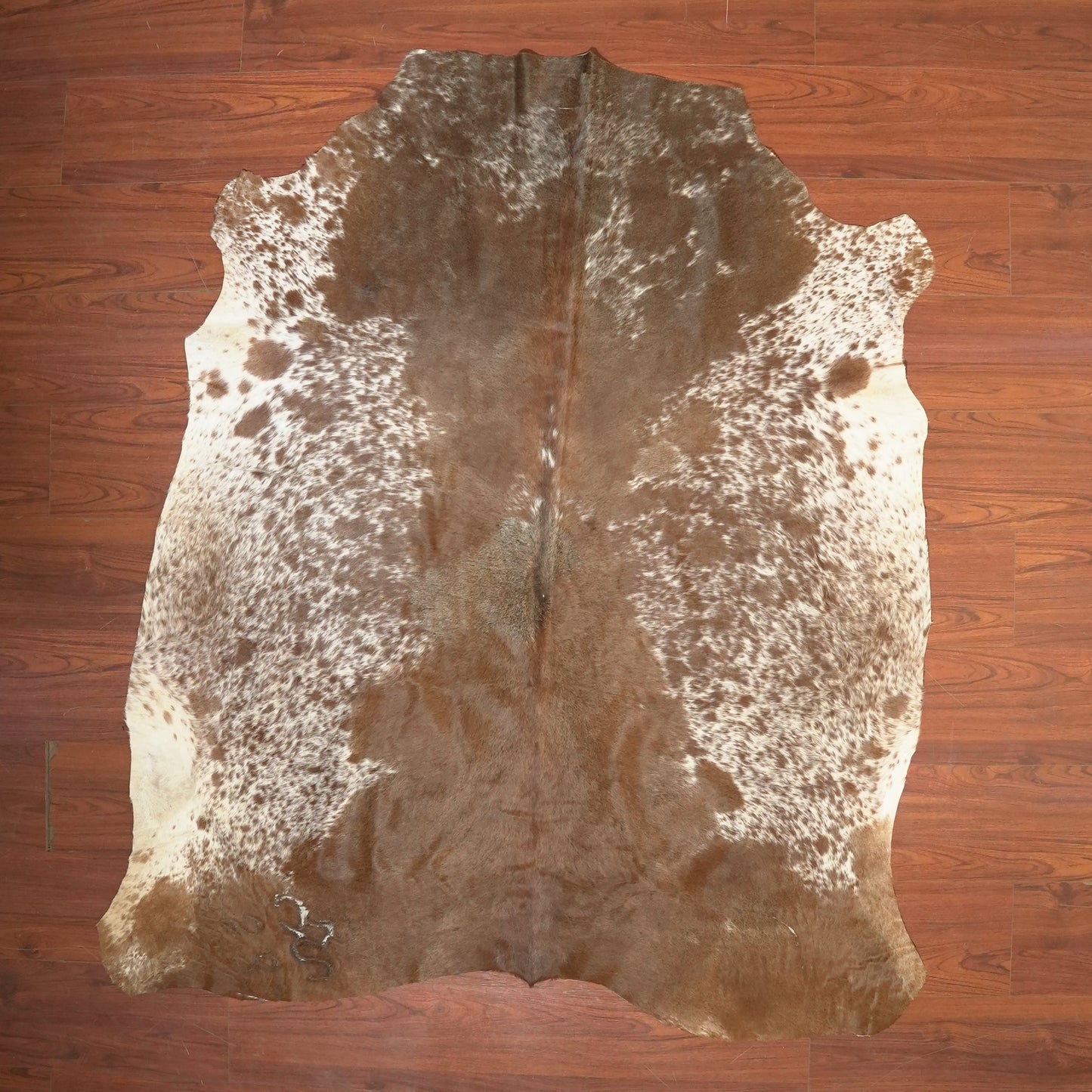The Nguni Guy Nguni cowhide African decor Authentic cowhide Home decor Interior design Unique pattern Hand-selected Premium quality Natural beauty Exotic rug Genuine hide Statement piece Contemporary style Ethically sourced Sustainable decor Versatile accent Luxury rug Designer piece Modern aesthetic High-end craftsmanship Timeless elegance Designer home accents

