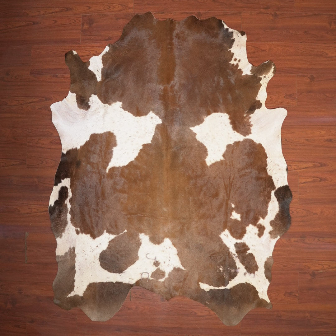 The Nguni Guy Nguni cowhide African decor Authentic cowhide Home decor Interior design Unique pattern Hand-selected Premium quality Natural beauty Exotic rug Genuine hide Statement piece Contemporary style Ethically sourced Sustainable decor Versatile accent Luxury rug Designer piece Modern aesthetic High-end craftsmanship Timeless elegance Designer home accents
