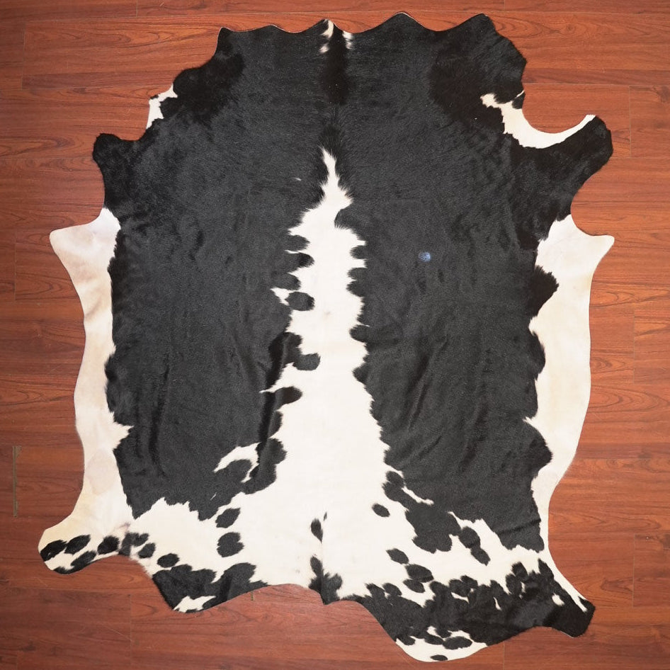 The Nguni Guy Nguni cowhide African decor Authentic cowhide Home decor Interior design Unique pattern Hand-selected Premium quality Natural beauty Exotic rug Genuine hide Statement piece Contemporary style Ethically sourced Sustainable decor Versatile accent Luxury rug Designer piece Modern aesthetic High-end craftsmanship Timeless elegance Designer home accents
