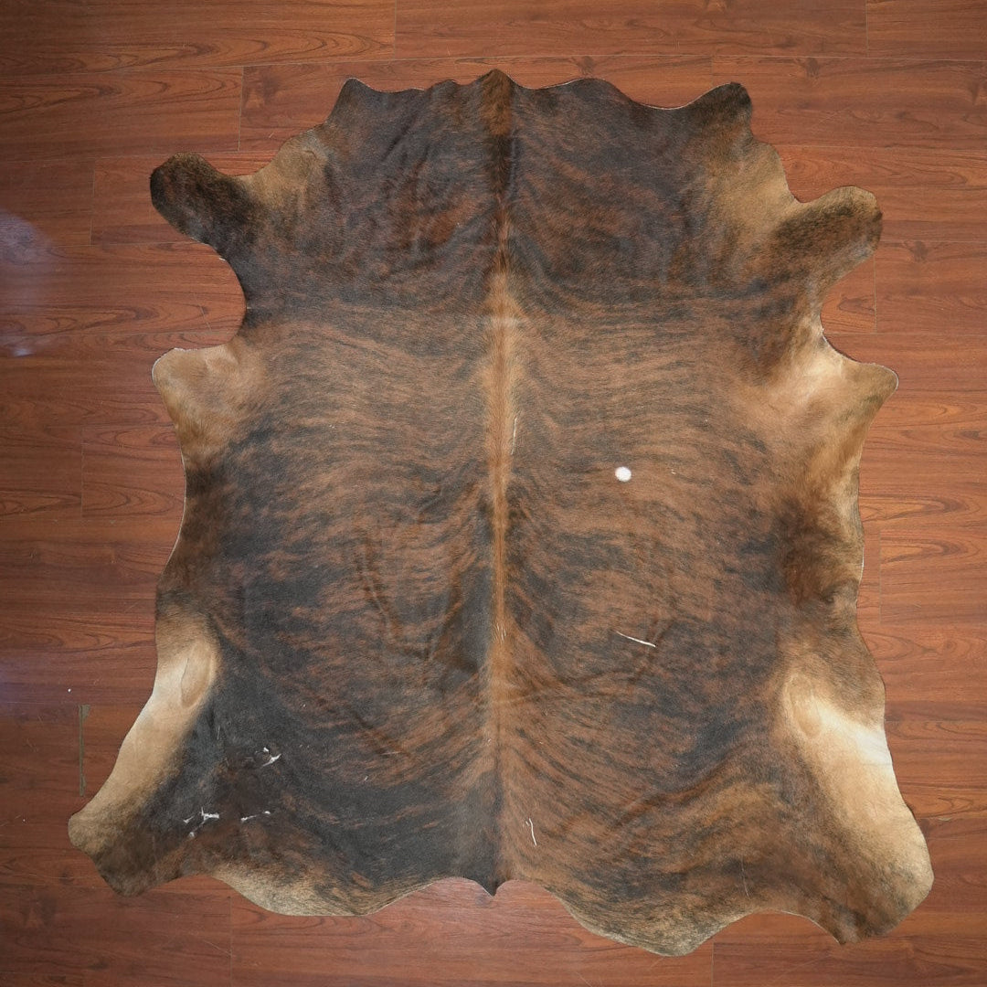 The Nguni Guy Nguni cowhide African decor Authentic cowhide Home decor Interior design Unique pattern Hand-selected Premium quality Natural beauty Exotic rug Genuine hide Statement piece Contemporary style Ethically sourced Sustainable decor Versatile accent Luxury rug Designer piece Modern aesthetic High-end craftsmanship Timeless elegance Designer home accents
