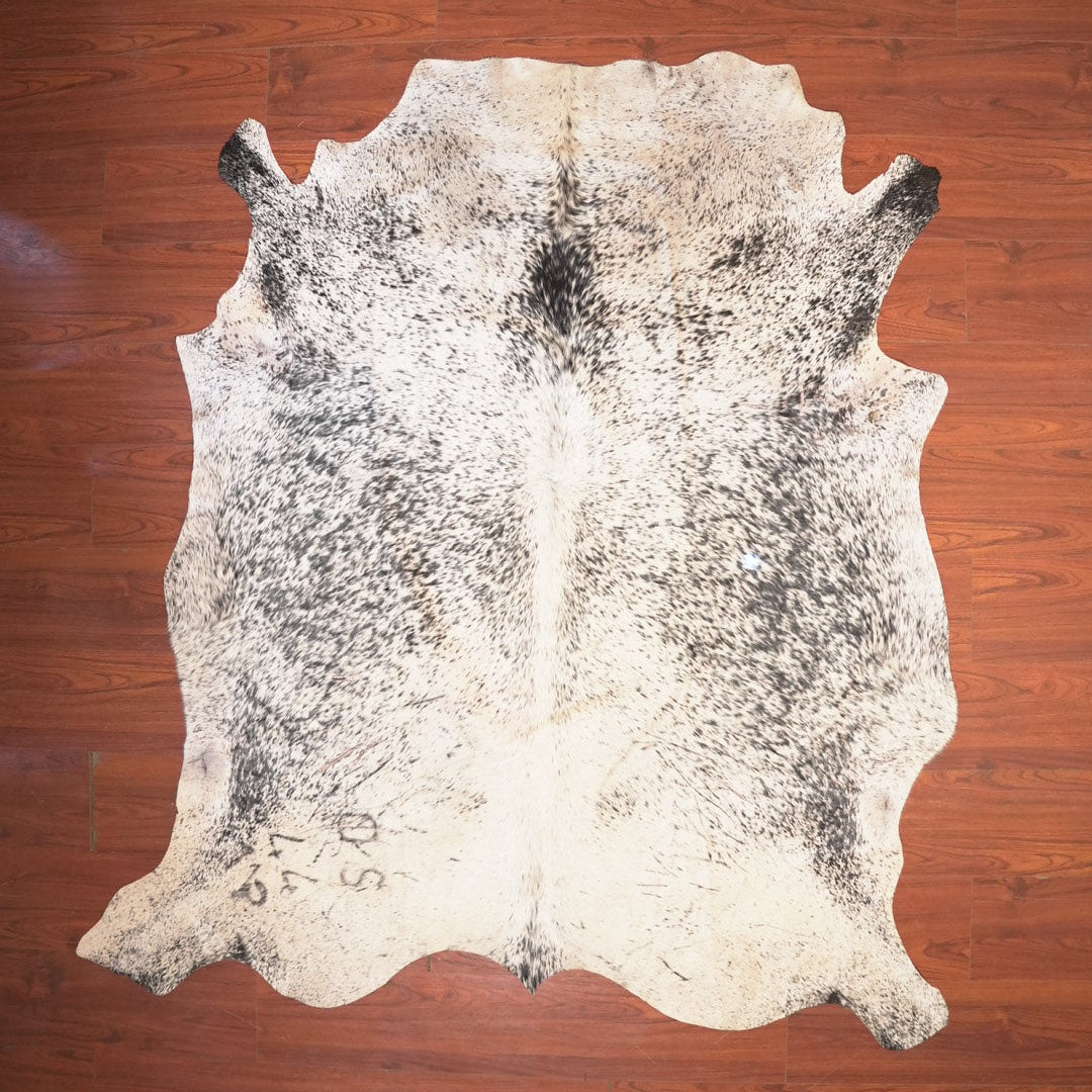 The Nguni Guy Nguni cowhide African decor Authentic cowhide Home decor Interior design Unique pattern Hand-selected Premium quality Natural beauty Exotic rug Genuine hide Statement piece Contemporary style Ethically sourced Sustainable decor Versatile accent Luxury rug Designer piece Modern aesthetic High-end craftsmanship Timeless elegance Designer home accents
