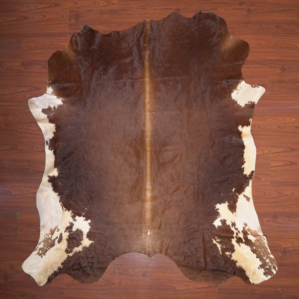 The Nguni Guy Nguni cowhide African decor Authentic cowhide Home decor Interior design Unique pattern Hand-selected Premium quality Natural beauty Exotic rug Genuine hide Statement piece Contemporary style Ethically sourced Sustainable decor Versatile accent Luxury rug Designer piece Modern aesthetic High-end craftsmanship Timeless elegance Designer home accents
