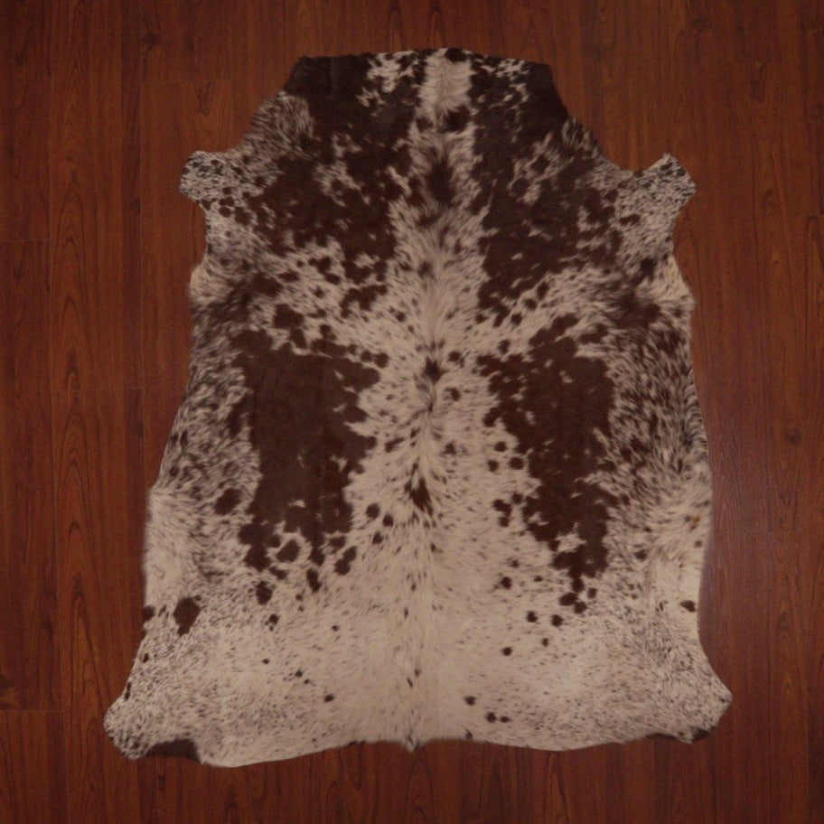 The Nguni Guy Nguni cowhide Black and white cowhide Speckled cowhide African decor Authentic cowhide Home decor Interior design Unique pattern Hand-selected Premium quality Natural beauty Exotic rug Genuine hide Statement piece Contemporary style Ethically sourced Sustainable decor Versatile accent Luxury rug Designer piece Modern aesthetic High-end craftsmanship Timeless elegance Designer home accents