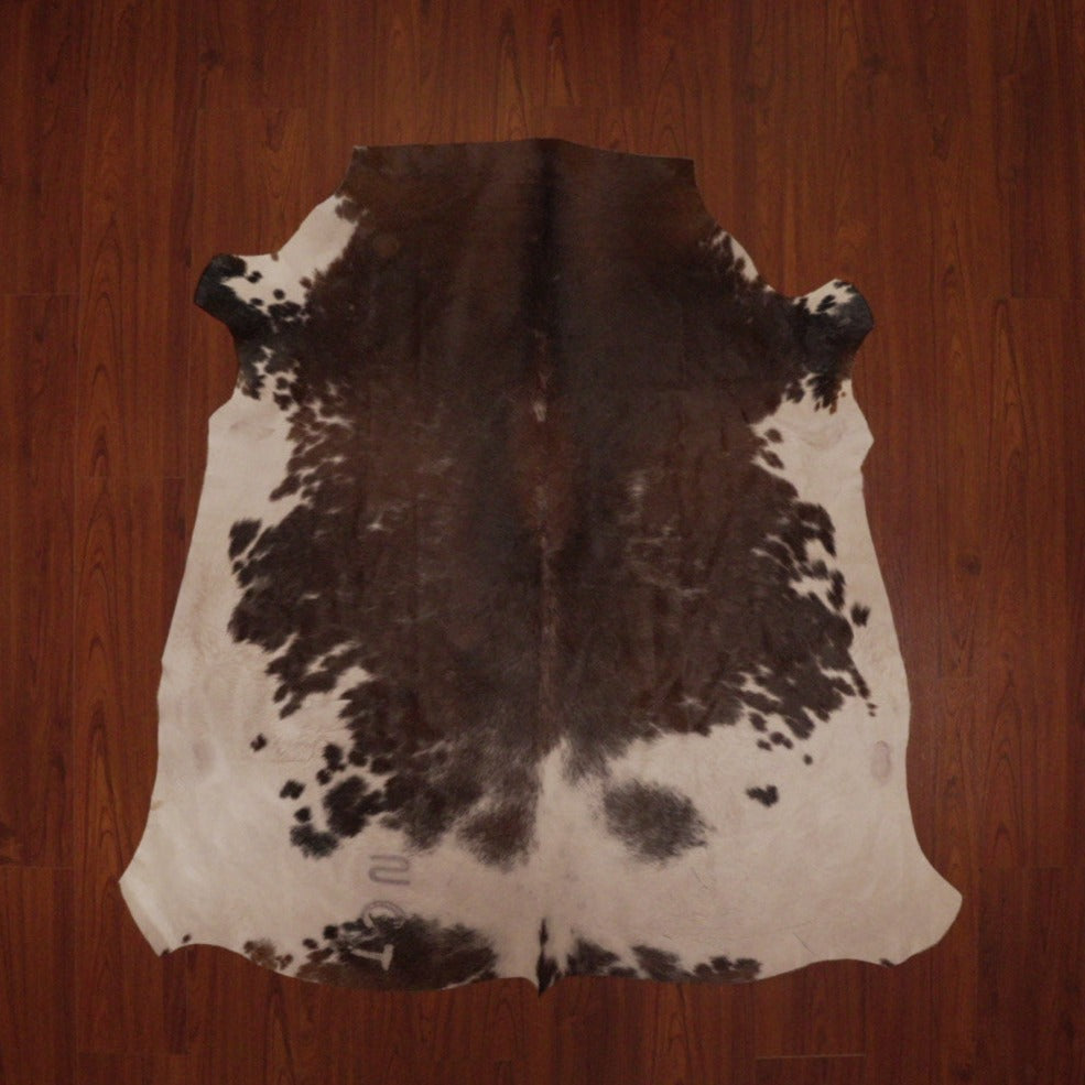 The Nguni Guy Nguni cowhide Black and white cowhide Speckled cowhide African decor Authentic cowhide Home decor Interior design Unique pattern Hand-selected Premium quality Natural beauty Exotic rug Genuine hide Statement piece Contemporary style Ethically sourced Sustainable decor Versatile accent Luxury rug Designer piece Modern aesthetic High-end craftsmanship Timeless elegance Designer home accents