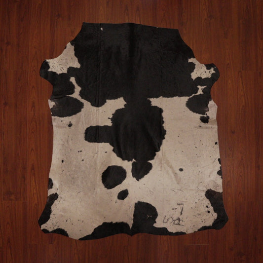 The Nguni Guy Nguni cowhide Black and white cowhide Speckled cowhide African decor Authentic cowhide Home decor Interior design Unique pattern Hand-selected Premium quality Natural beauty Exotic rug Genuine hide Statement piece Contemporary style Ethically sourced Sustainable decor Versatile accent Luxury rug Designer piece Modern aesthetic High-end craftsmanship Timeless elegance Designer home accents