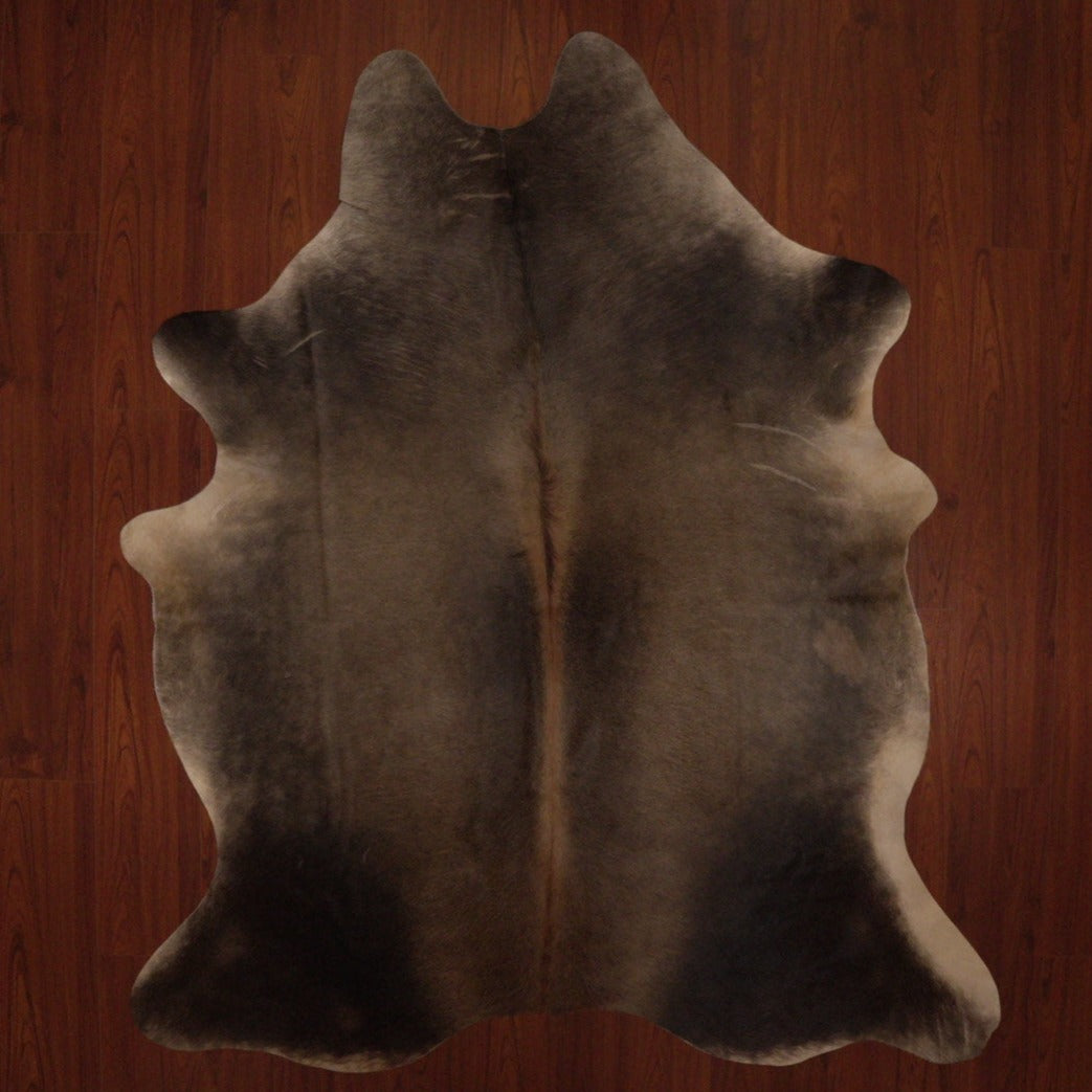 The Nguni Guy Nguni cowhide grey dun cowhide solid cowhide African decor Authentic cowhide Home decor Interior design Unique pattern Hand-selected Premium quality Natural beauty Exotic rug Genuine hide Statement piece Contemporary style Ethically sourced Sustainable decor Versatile accent Luxury rug Designer piece Modern aesthetic High-end craftsmanship Timeless elegance Designer home accents