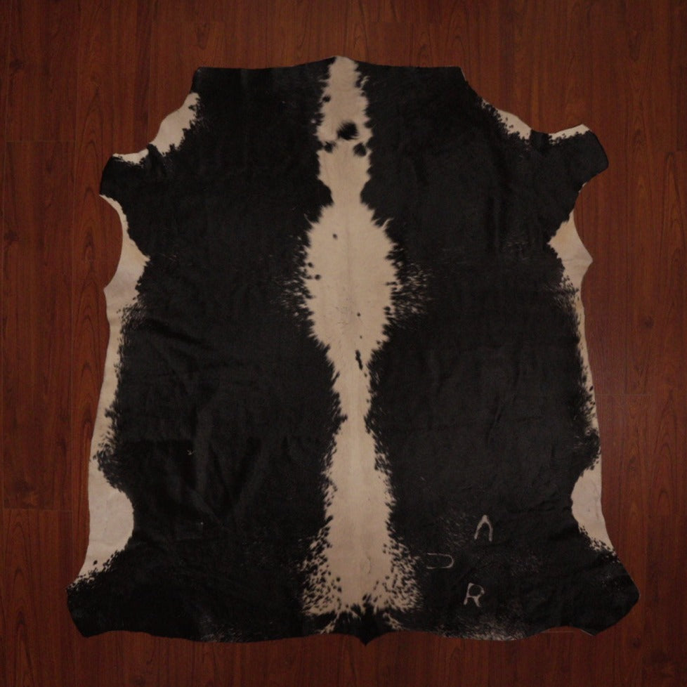 The Nguni Guy Nguni cowhide Black and white cowhide Panelled cowhide African decor Authentic cowhide Home decor Interior design Unique pattern Hand-selected Premium quality Natural beauty Exotic rug Genuine hide Statement piece Contemporary style Ethically sourced Sustainable decor Versatile accent Luxury rug Designer piece Modern aesthetic High-end craftsmanship Timeless elegance Designer home accents