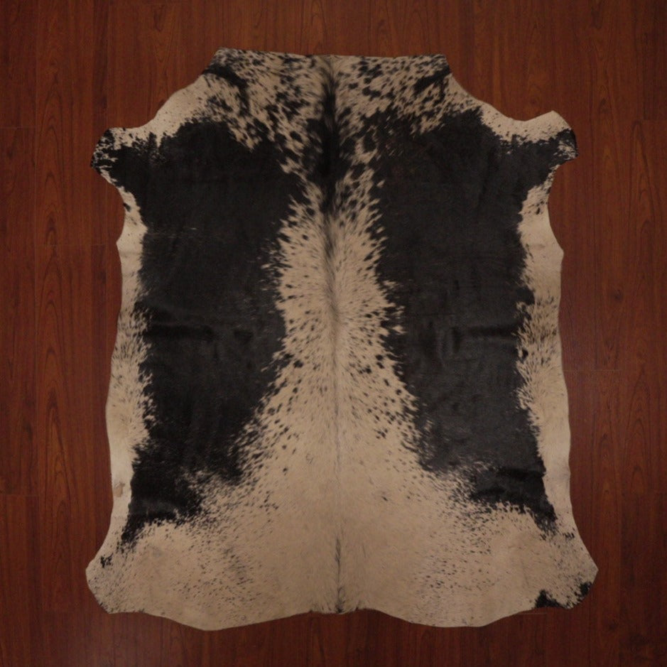 The Nguni Guy Nguni cowhide African decor Authentic cowhide Home decor Interior design Unique pattern Hand-selected Premium quality Natural beauty Exotic rug Genuine hide Statement piece Contemporary style Ethically sourced Sustainable decor Versatile accent Luxury rug Designer piece Modern aesthetic High-end craftsmanship Timeless elegance Designer home accents