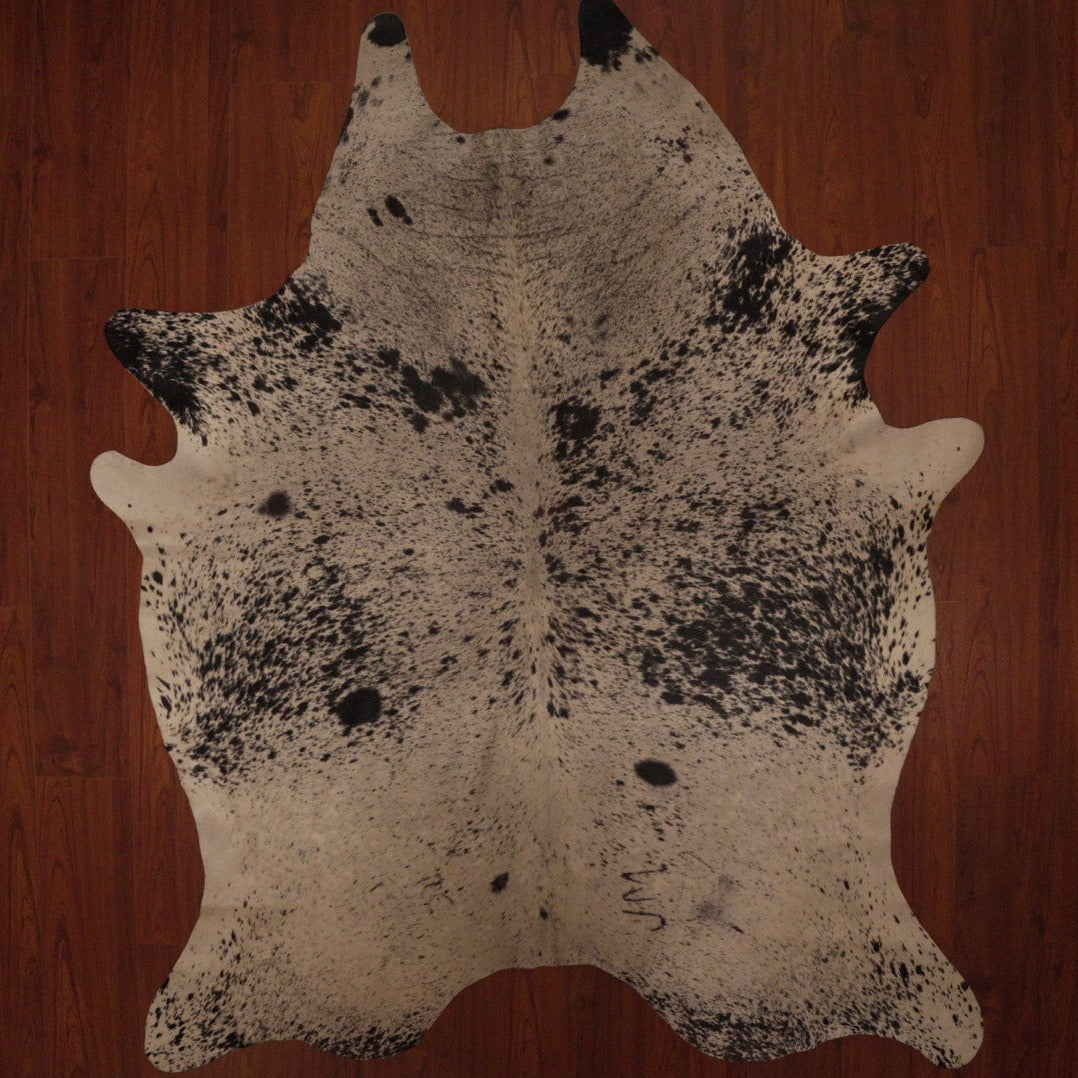 The Nguni Guy Nguni cowhide African decor Authentic cowhide Home decor Interior design Unique pattern Hand-selected Premium quality Natural beauty Exotic rug Genuine hide Statement piece Contemporary style Ethically sourced Sustainable decor Versatile accent Luxury rug Designer piece Modern aesthetic High-end craftsmanship Timeless elegance Designer home accents