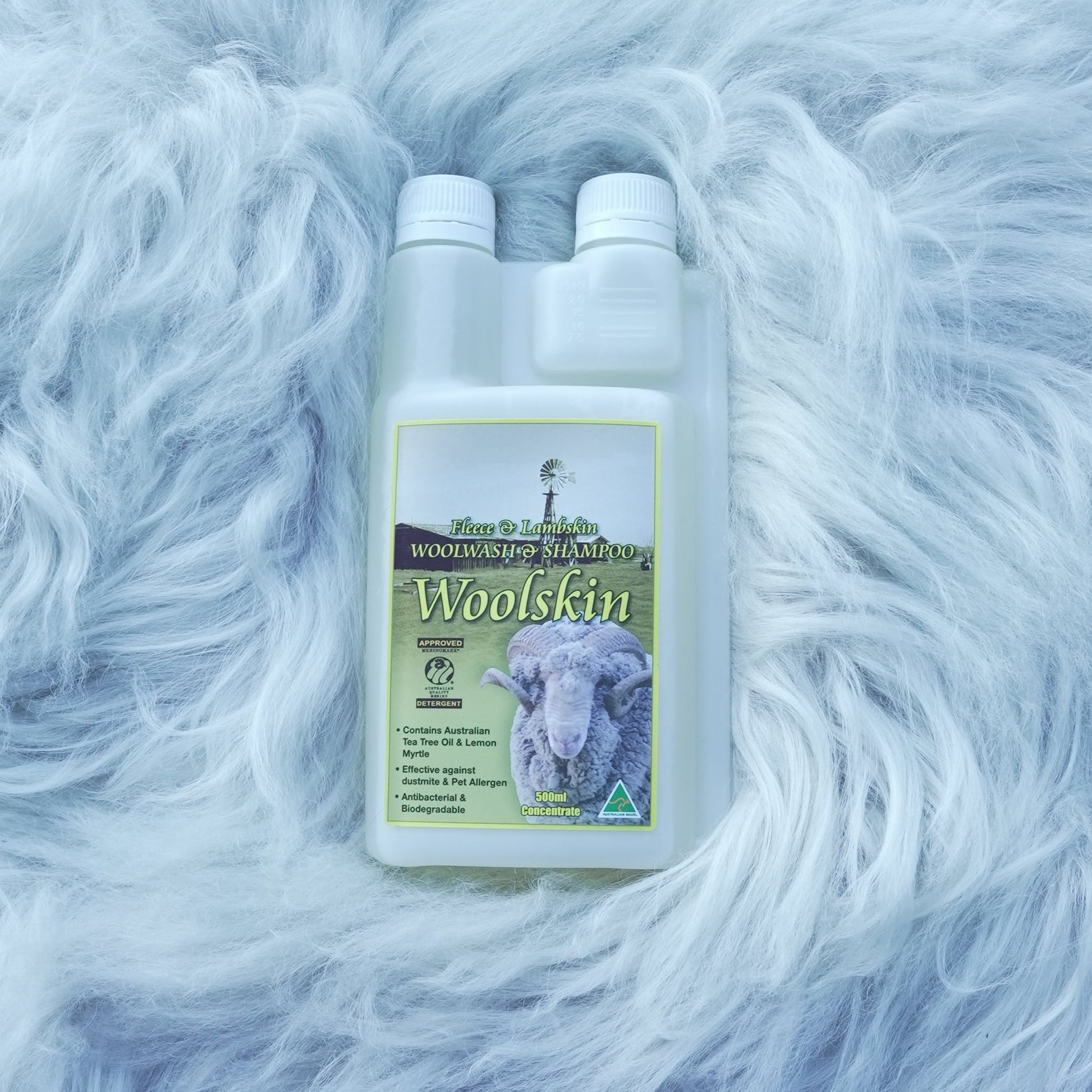 Bottled woolwash shampoo on sheepskin