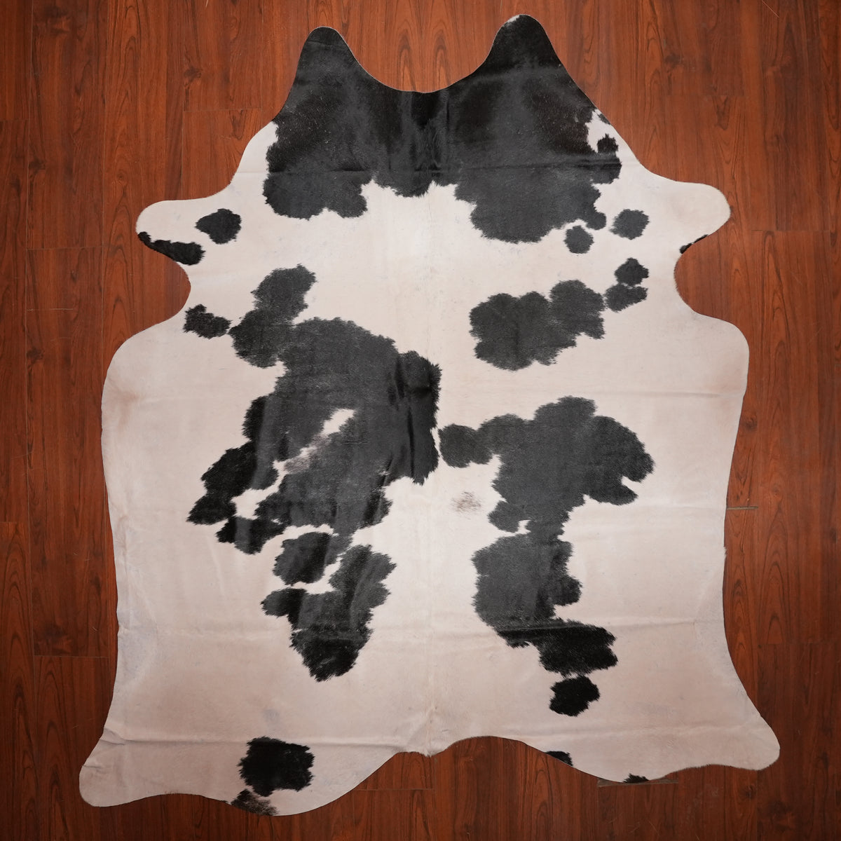 Cloud-Patch Black cow hide rug, 236 x 210 cm, genuine cowhide