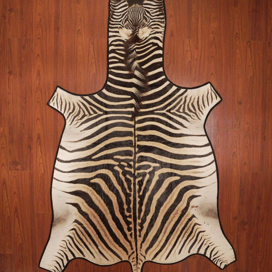 The Nguni Guy Nguni cowhide African decor Authentic cowhide Home decor Interior design Unique pattern Hand-selected Premium quality Natural beauty Exotic rug Genuine hide Statement piece Contemporary style Ethically sourced Sustainable decor Versatile accent Luxury rug Designer piece Modern aesthetic High-end craftsmanship Timeless elegance Designer home accents