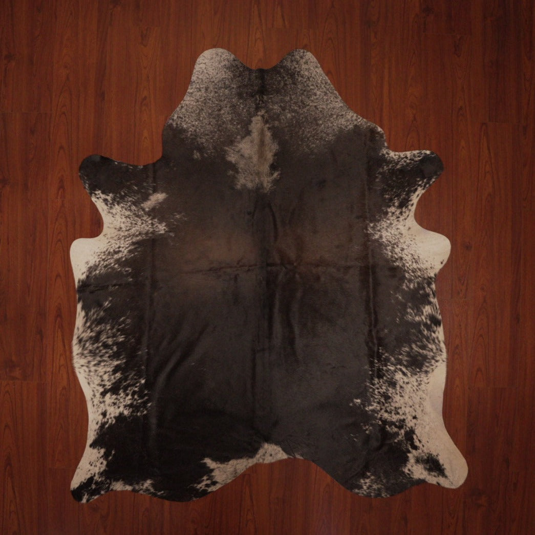 The Nguni Guy Nguni cowhide African decor Authentic cowhide Home decor Interior design Unique pattern Hand-selected Premium quality Natural beauty Exotic rug Genuine hide Statement piece Contemporary style Ethically sourced Sustainable decor Versatile accent Luxury rug Designer piece Modern aesthetic High-end craftsmanship Timeless elegance Designer home accents