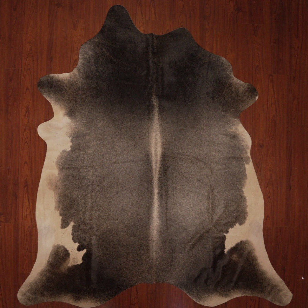 The Nguni Guy Nguni cowhide African decor Authentic cowhide Home decor Interior design Unique pattern Hand-selected Premium quality Natural beauty Exotic rug Genuine hide Statement piece Contemporary style Ethically sourced Sustainable decor Versatile accent Luxury rug Designer piece Modern aesthetic High-end craftsmanship Timeless elegance Designer home accents