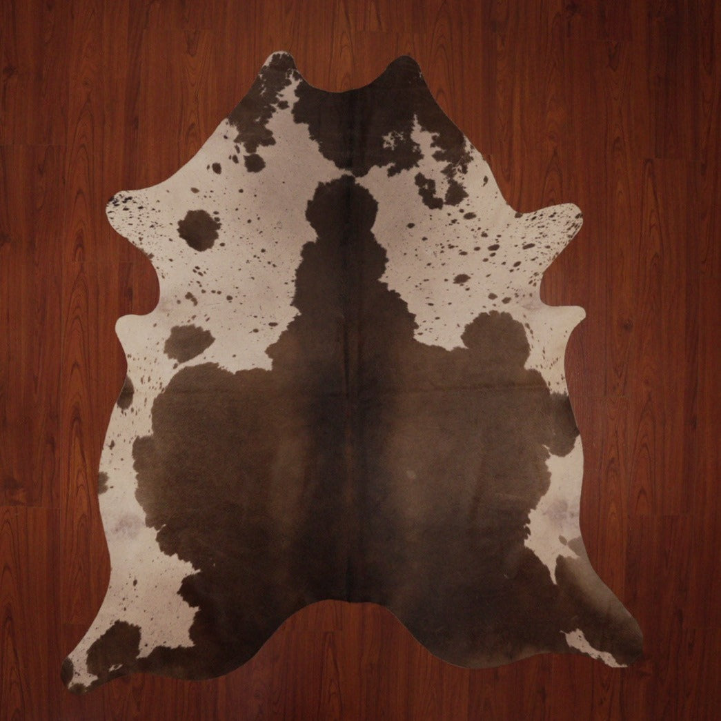 The Nguni Guy Nguni cowhide African decor Authentic cowhide Home decor Interior design Unique pattern Hand-selected Premium quality Natural beauty Exotic rug Genuine hide Statement piece Contemporary style Ethically sourced Sustainable decor Versatile accent Luxury rug Designer piece Modern aesthetic High-end craftsmanship Timeless elegance Designer home accents