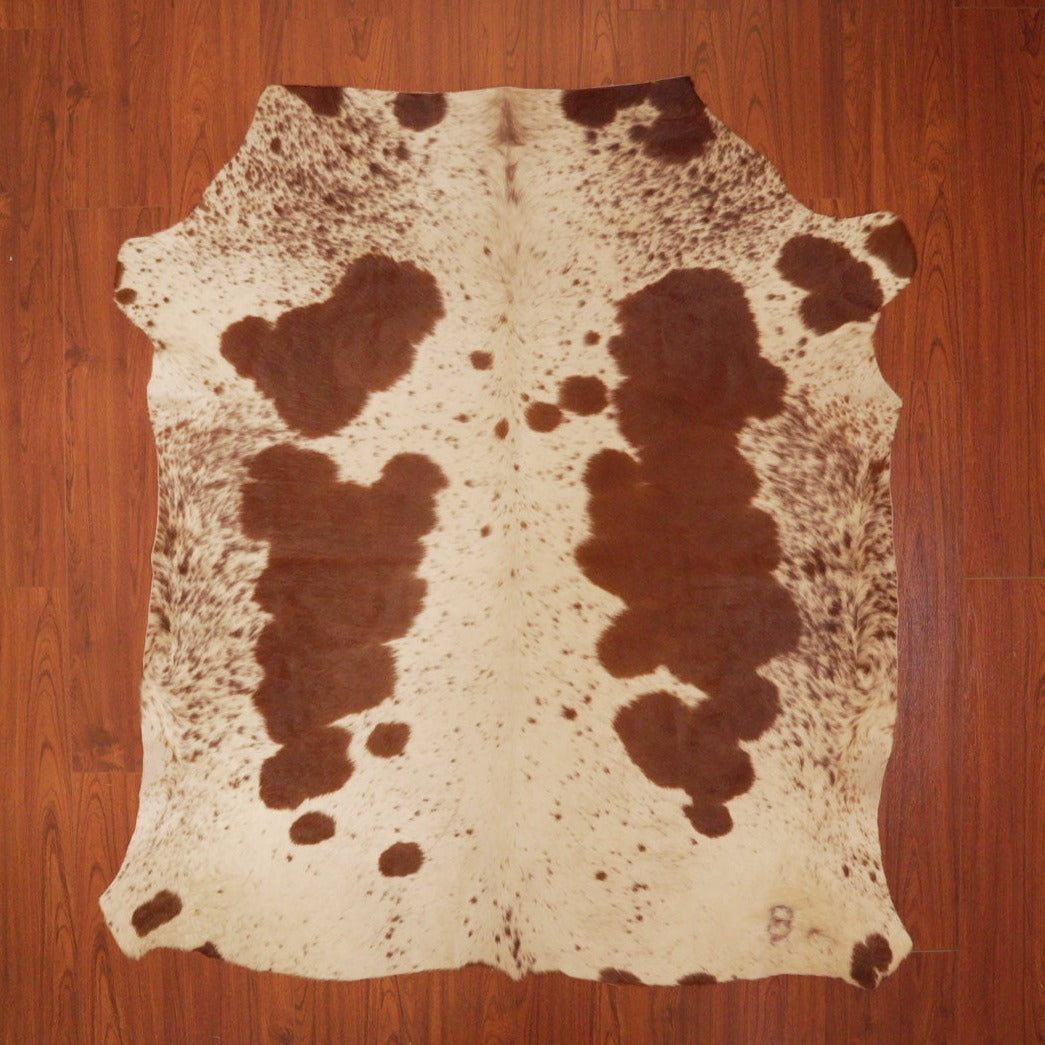 The Nguni Guy Nguni cowhide African decor Authentic cowhide Home decor Interior design Unique pattern Hand-selected Premium quality Natural beauty Exotic rug Genuine hide Statement piece Contemporary style Ethically sourced Sustainable decor Versatile accent Luxury rug Designer piece Modern aesthetic High-end craftsmanship Timeless elegance Designer home accents