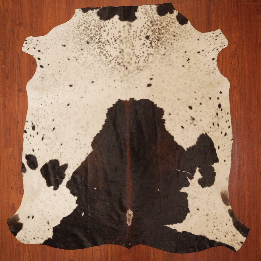 The Nguni Guy Nguni cowhide African decor Authentic cowhide Home decor Interior design Unique pattern Hand-selected Premium quality Natural beauty Exotic rug Genuine hide Statement piece Contemporary style Ethically sourced Sustainable decor Versatile accent Luxury rug Designer piece Modern aesthetic High-end craftsmanship Timeless elegance Designer home accents