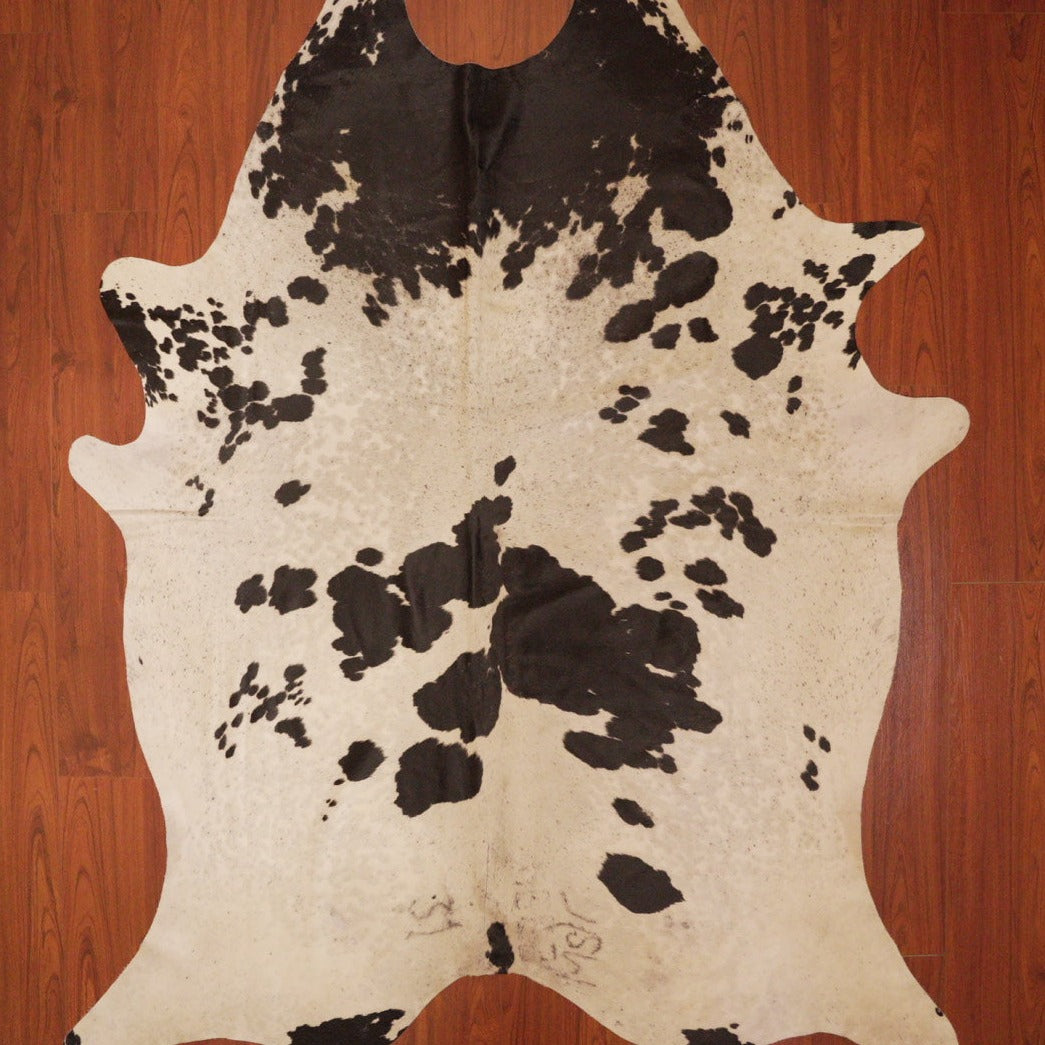 The Nguni Guy Nguni cowhide African decor Authentic cowhide Home decor Interior design Unique pattern Hand-selected Premium quality Natural beauty Exotic rug Genuine hide Statement piece Contemporary style Ethically sourced Sustainable decor Versatile accent Luxury rug Designer piece Modern aesthetic High-end craftsmanship Timeless elegance Designer home accents