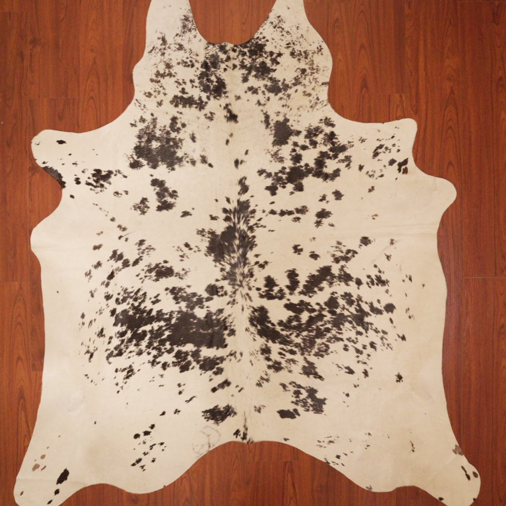 The Nguni Guy Nguni cowhide African decor Authentic cowhide Home decor Interior design Unique pattern Hand-selected Premium quality Natural beauty Exotic rug Genuine hide Statement piece Contemporary style Ethically sourced Sustainable decor Versatile accent Luxury rug Designer piece Modern aesthetic High-end craftsmanship Timeless elegance Designer home accents