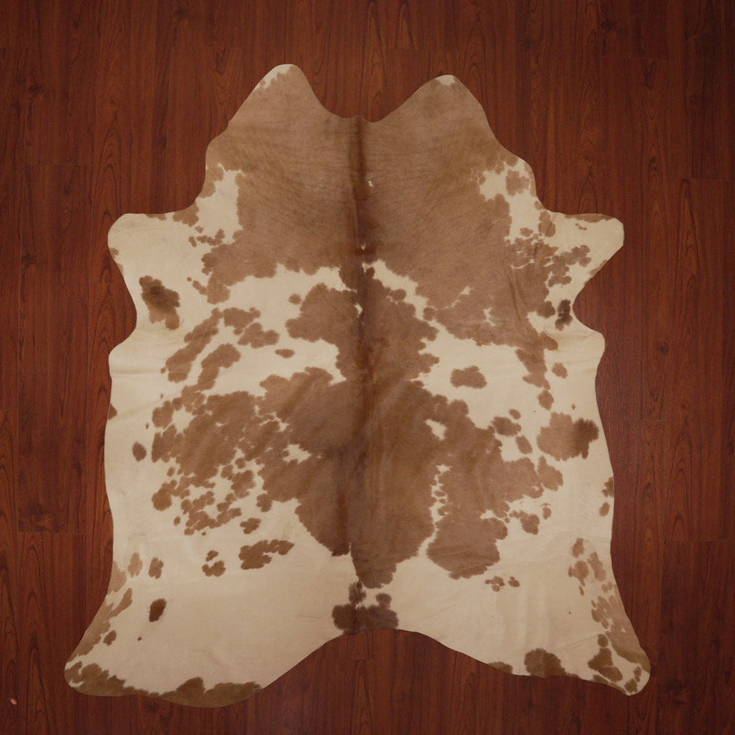 The Nguni Guy Nguni cowhide African decor Authentic cowhide Home decor Interior design Unique pattern Hand-selected Premium quality Natural beauty Exotic rug Genuine hide Statement piece Contemporary style Ethically sourced Sustainable decor Versatile accent Luxury rug Designer piece Modern aesthetic High-end craftsmanship Timeless elegance Designer home accents